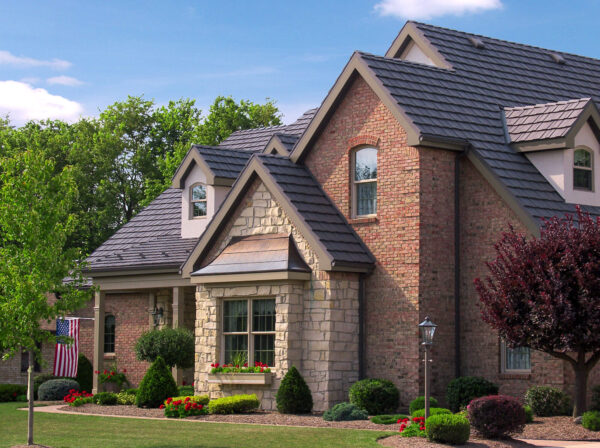 country manor shake metal roof brick house