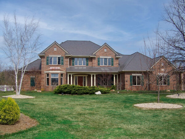 rustic shingle metal roofing brick house