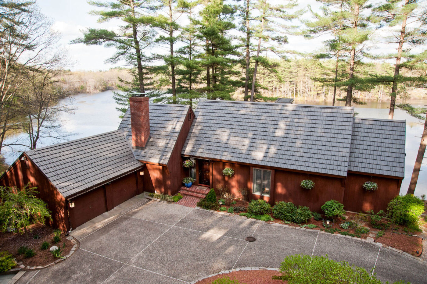 rustic shingle metal roofing lake house